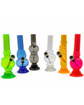 Set of colorful glass smoking accessories on a white background